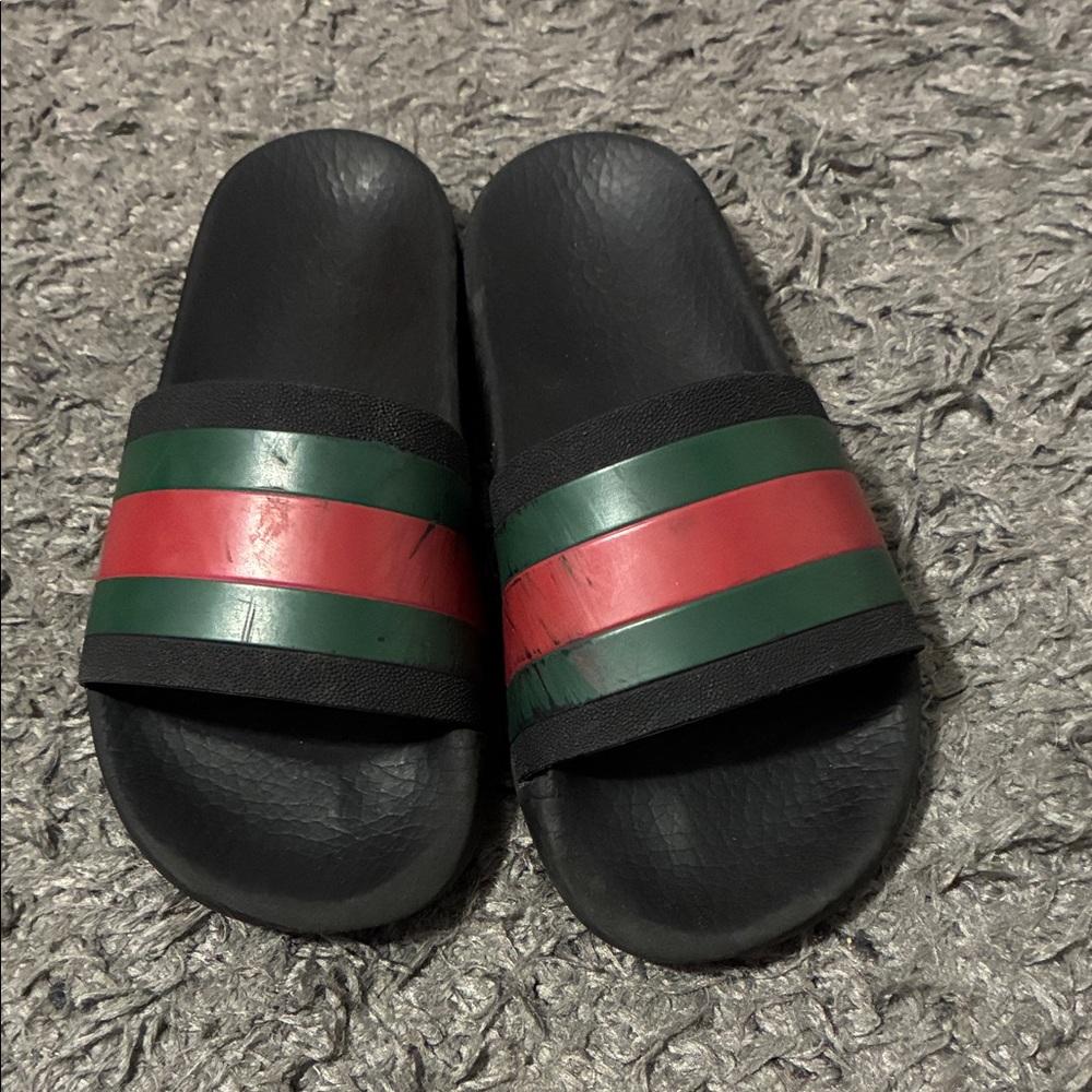 Black Gucci sandals